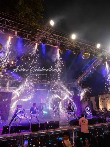 A stage lit up with cold pyrotechnics during a wedding choreography performance. I use special effects like these to elevate key moments and create a spectacular visual climax.