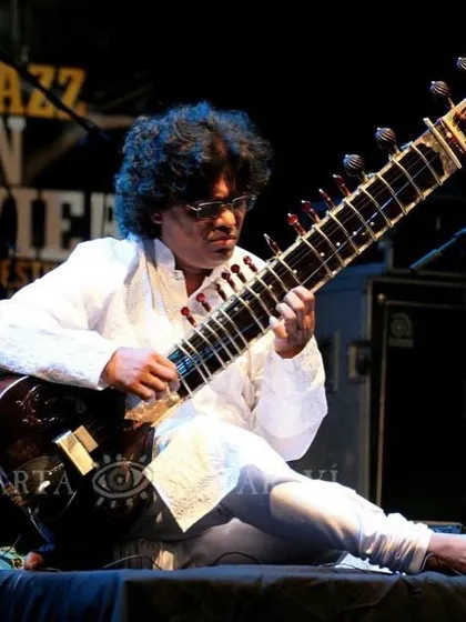 A profile shot of me used for the promotion of a classical recital in Chicago, describing the introspective and sublime experience of a sitar and tabla dialogue.