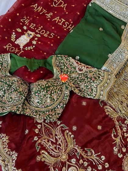 I love when brides include personal touches. For this bride, we embroidered her and her groom's names, the wedding date, and a sweet illustration of their dog, Roy, onto her bridal shawl, making it uniquely theirs.