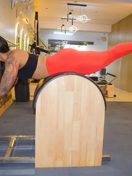 The "swan" on the Ladder Barrel is a powerful exercise for strengthening the entire back of your body, from your upper back down to your glutes and hamstrings.