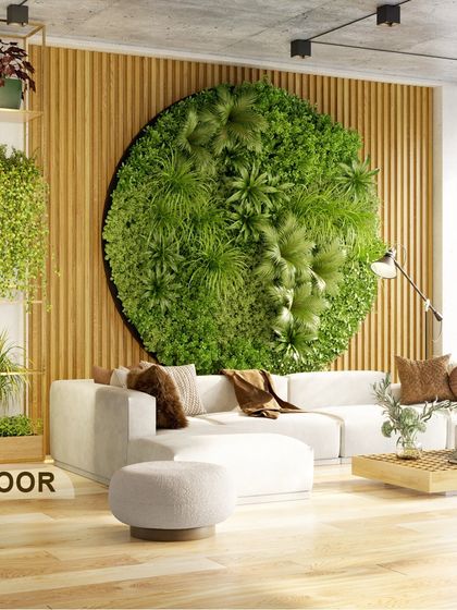 An example of a circular indoor vertical garden concept, designed to be a focal point in a contemporary living space. These installations bring a powerful dose of nature indoors, creating a calm and refreshing atmosphere.