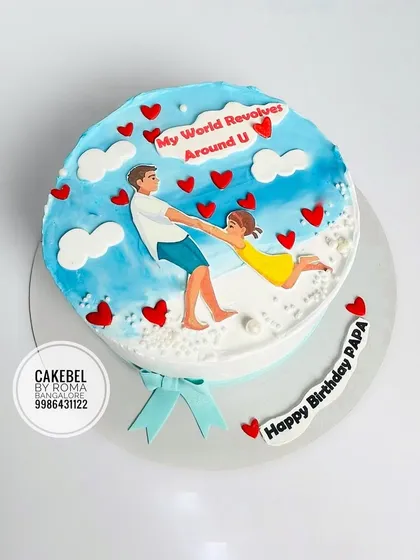 "My World Revolves Around U." A touching cake from a daughter to her papa, this design shows them spinning in a sky full of clouds and hearts.