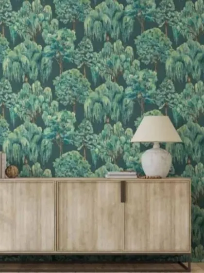 The repeating tree pattern in a darker, more saturated green. This creates a bolder, more dramatic look compared to the lighter versions.