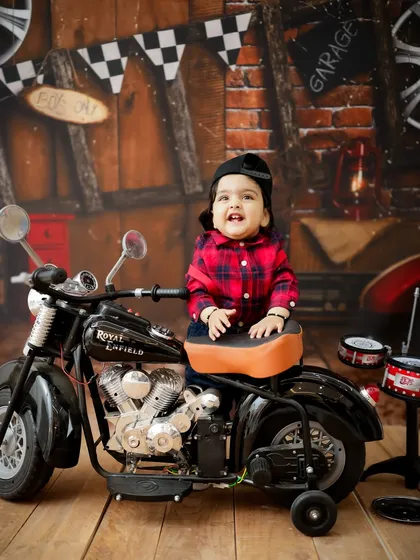Let's have some fun! I offer a wide range of creative and themed photoshoots, like this cool little biker setup, complete with a miniature Royal Enfield.