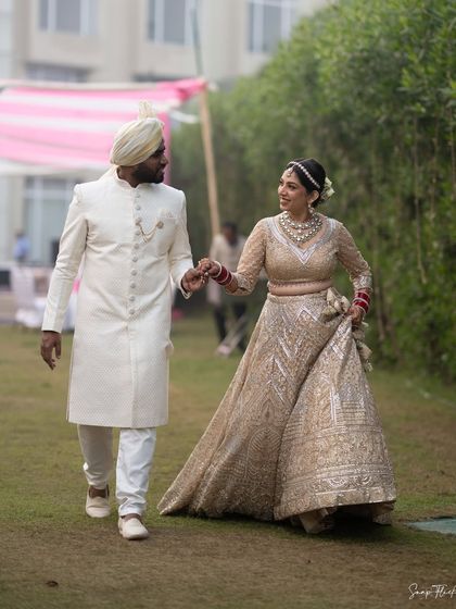 A candid walking shot of the beautiful couple. Ria's makeup looks fresh and stays put, even on the move during a busy wedding day.