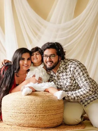 A beautiful family portrait filled with smiles. Our studio sessions are designed to be comfortable and fun, allowing us to capture genuine interactions between you and your child.