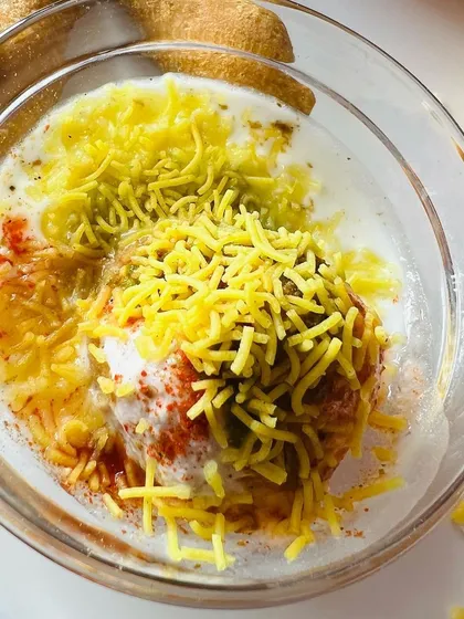 My Dahi Vada is known for being super soft and juicy. It's a classic chaat item that I always recommend, topped with fresh sev for that perfect crunch.