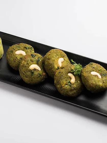 Our Hara Bhara Kababs are a healthy and delicious starter. Made with spinach, peas, and potatoes, and lightly spiced, they are served with a fresh mint chutney for a perfect beginning to your event's feast.