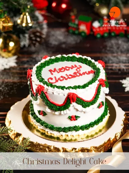Our Christmas Delight Cake is a classic holiday treat. This two-tiered white cake is decorated with traditional red and green frosting, wishing everyone a Merry Christmas.