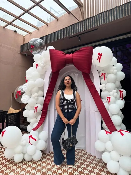 A fun, expressive shot from the same event. My style is all about having fun with fashion and not taking it too seriously.
