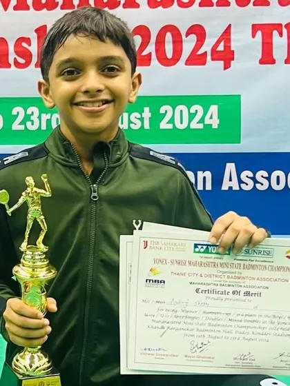 Adhiraj Shetty with his winner's trophy and certificate of merit from the Mini State Championship in Thane.