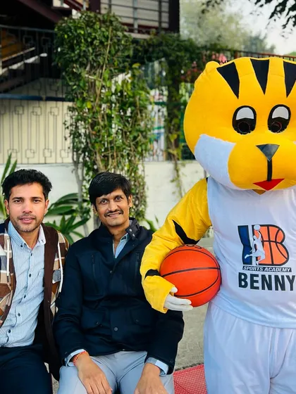 Our head coach, myself, and our guest of honor, Mr. Mohit Bhandari, with our academy mascot, Benny. A great moment celebrating basketball excellence.