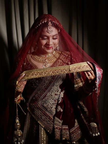 A beautiful shot of the bride holding her wedding belt. The details are just exquisite.