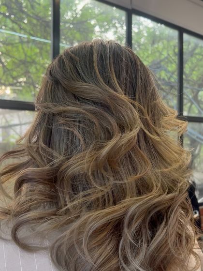 A closer look at the waves and color, showing the intricate blend of highlights and lowlights.