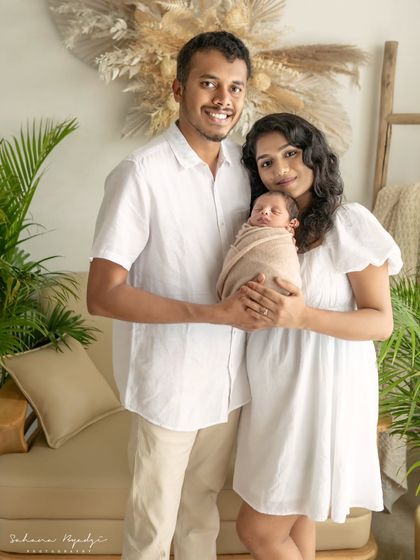 A joyful and happy family, welcoming their new baby. These first family portraits are so important and special.