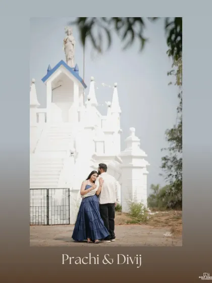 A portrait of the couple in a sweet embrace in front of the white church, capturing a timeless and romantic pre-wedding moment.