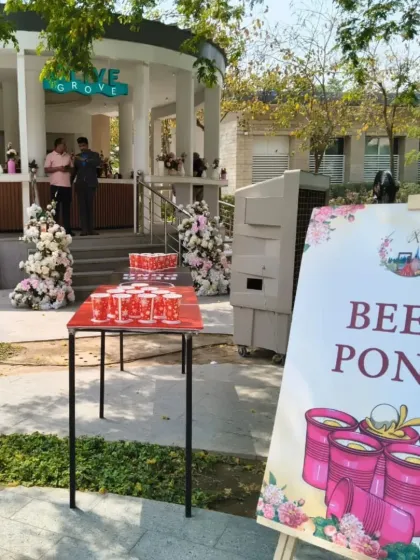 A complete game setup for a Haldi function, featuring a Beer Pong table, Giant Jenga, and an Archery station. I can create a full gaming zone for your wedding event.