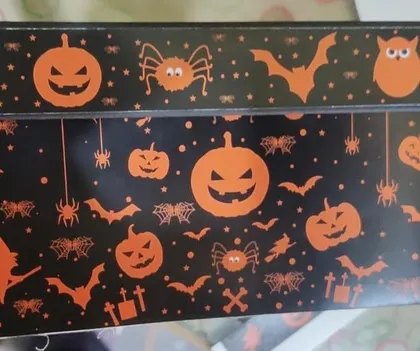 The final custom-printed box for our Halloween project. The wrap-around design ensured the spooky theme was visible from every angle.