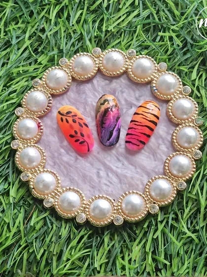 A vibrant collection of student work featuring ombre, animal prints, and leaf motifs. This shows the wide range of techniques covered in our courses.
