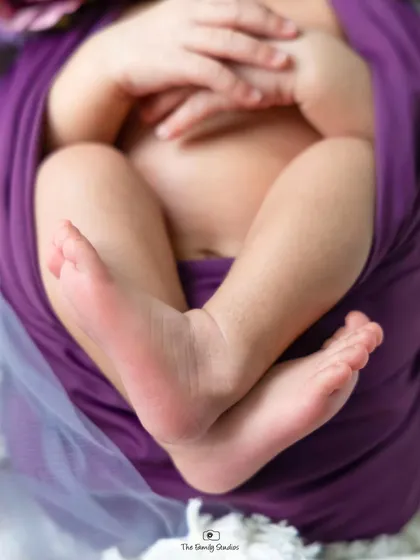 Tiny toes and wrinkled feet. We make sure to capture every precious detail during our newborn photoshoots.