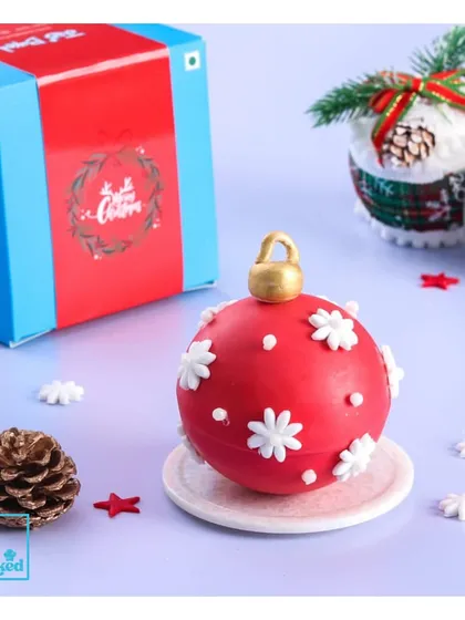 Our special Christmas ornament hot chocolate bomb. Just drop this red bauble into a cup of hot milk and watch it melt into a rich, decadent drink.