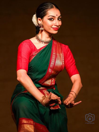 A similar pose from the Navarasotsava performance, showing a different nuance in expression. Each movement, no matter how small, can change the meaning of the story.