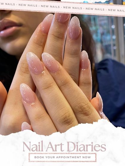 A close-up of these sparkling ombre nails, showing the fine glitter detail. I use high-quality gel polish to ensure the finish is smooth and the sparkle is brilliant.