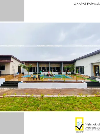 A view across the lawn towards the main building's long verandah. This open, connected space encourages guests to move freely and enjoy the fresh air and greenery.