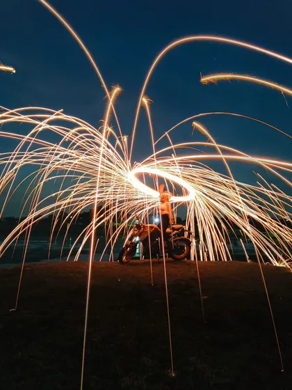 A different long exposure effect with steel wool, creating long, elegant trails of light.