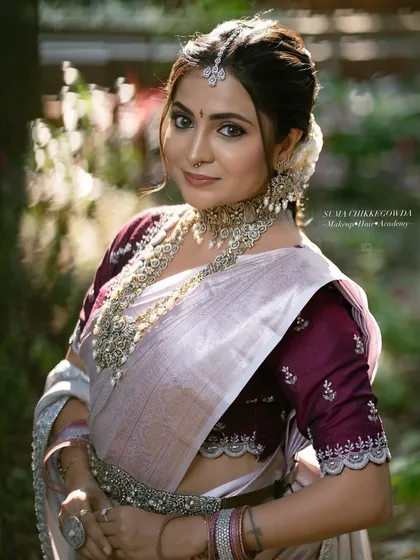 Silver jewelry is a beautiful choice for modern brides. Here, I've created a soft, ethereal makeup look with a hint of shimmer on the eyes and a gentle pink lip to complement the cool tones of the silver, perfect for a reception or engagement.