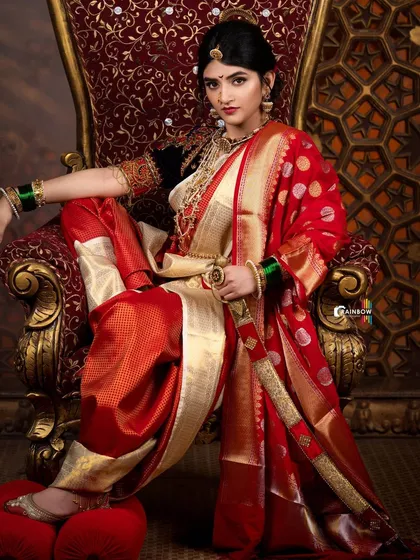 A variation of the Sreeleela shoot, this time with a red and gold saree, showing how we play with color and texture to build a visual story.