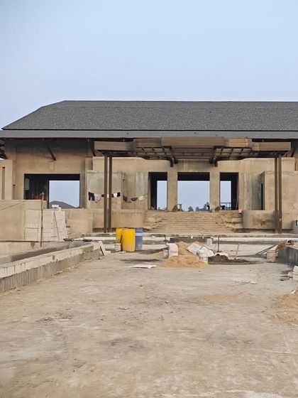 The main structure of our luxury villa project in Bhubaneswar taking shape. This image captures the building's strong, grounded presence and the initial framework that will eventually become an elegant farmhouse blending comfort with sophisticated design.