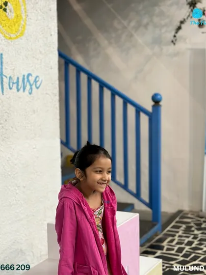 A mermaid in training. This young participant is all smiles at the Swimming Gala, excited to be part of the event.
