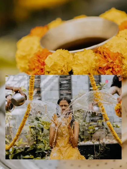 An artistic shot of a young woman during her Mangala Snaanam, with water splashing around her.