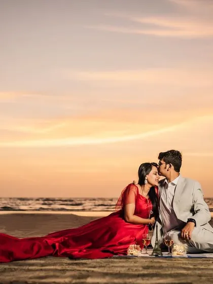 A dreamy sunset picnic on the beach. I help style these moments with props and dramatic dresses to create those truly unforgettable, movie-like shots.