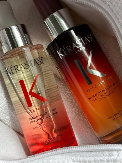 A close-up shot of the Kérastase serums, highlighting their rich textures. These products provide salon-quality nourishment.