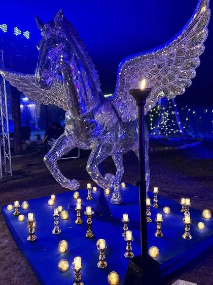 A magnificent crystal-studded Pegasus statue was the centrepiece of this elite New Year's Eve party. We love incorporating large-scale, statement decor pieces.