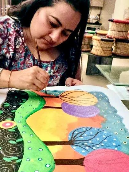 Lost in the world of color, a student paints an imaginative, abstract landscape. My studio is a place where adults can freely express their creativity without any pressure or judgment.