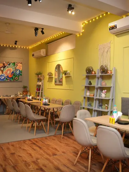 While the kids explore, parents can relax in our cozy and welcoming cafe. It's a comfortable space designed for you to unwind with a coffee and connect with other parents.