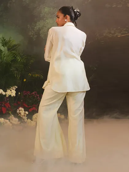 The back view of the ivory Azalea Co-Ord Set, showing the clean lines of this contemporary and elegant ensemble.