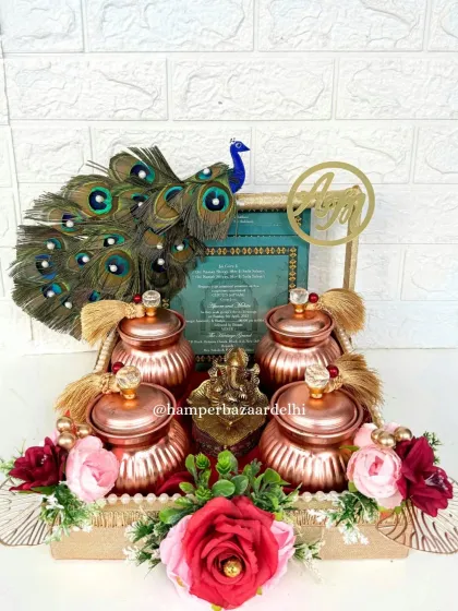 The complete view of our peacock themed wedding invitation hamper. It's a truly unforgettable way to invite guests to your wedding.