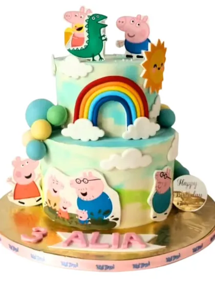 Everyone's favorite, Peppa Pig! This cheerful two-tiered cake brings the world of Peppa to life with edible cutouts of the whole family, a bright rainbow, and fluffy clouds.