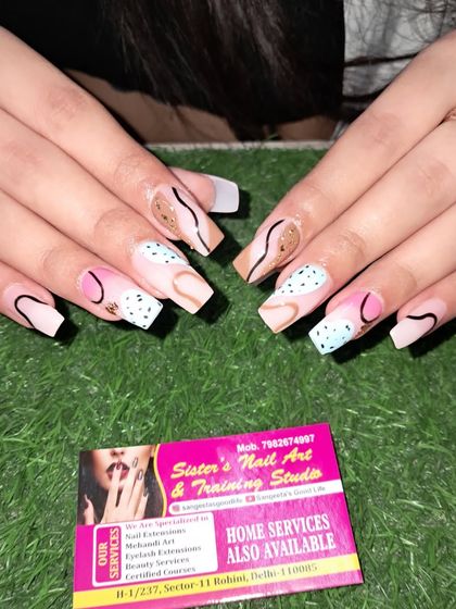 A still image of this creative and colorful abstract nail art.