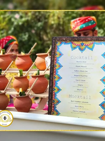 Our curated menu for a traditional themed event, displayed next to our rustic kulhad drink station. We offer a range of both cocktails and mocktails to suit all guests.