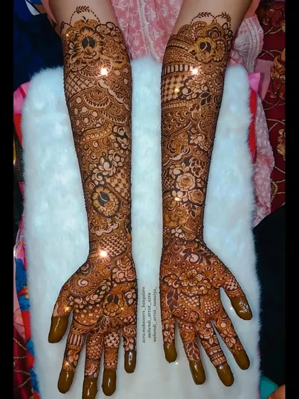 An example of my intricate bridal work, covering the full arms with dense patterns and a touch of sparkle for an extra special look.