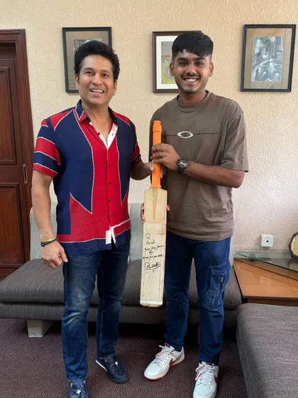 Ayush Mhatre receiving a signed bat from the legend, Sachin Tendulkar. An unforgettable moment of encouragement for a young player on the rise.
