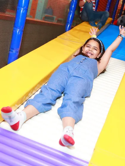 Pure happiness on the roller slide. The unique texture of this slide makes for a fun and bumpy ride down.