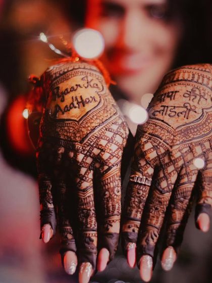 A beautifully captured photo of the finished design, with the phrases "Pyaar ka Aadhar" and "Papa ki Laadli" taking center stage.