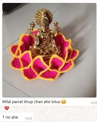 This photo, sent by a happy customer, fills my heart with gratitude. Seeing my crochet lotus aasan become a seat for her beautiful Lakshmi idol is the greatest reward. Her message, "Milal parcel khup chan ahe lotus" (Received the parcel, the lotus is very beautiful), made my day.