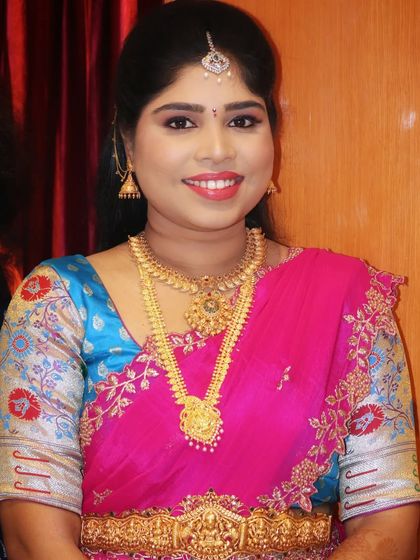 A happy bride on her engagement day. The makeup is designed to last through all the festivities while keeping her looking fresh and beautiful.